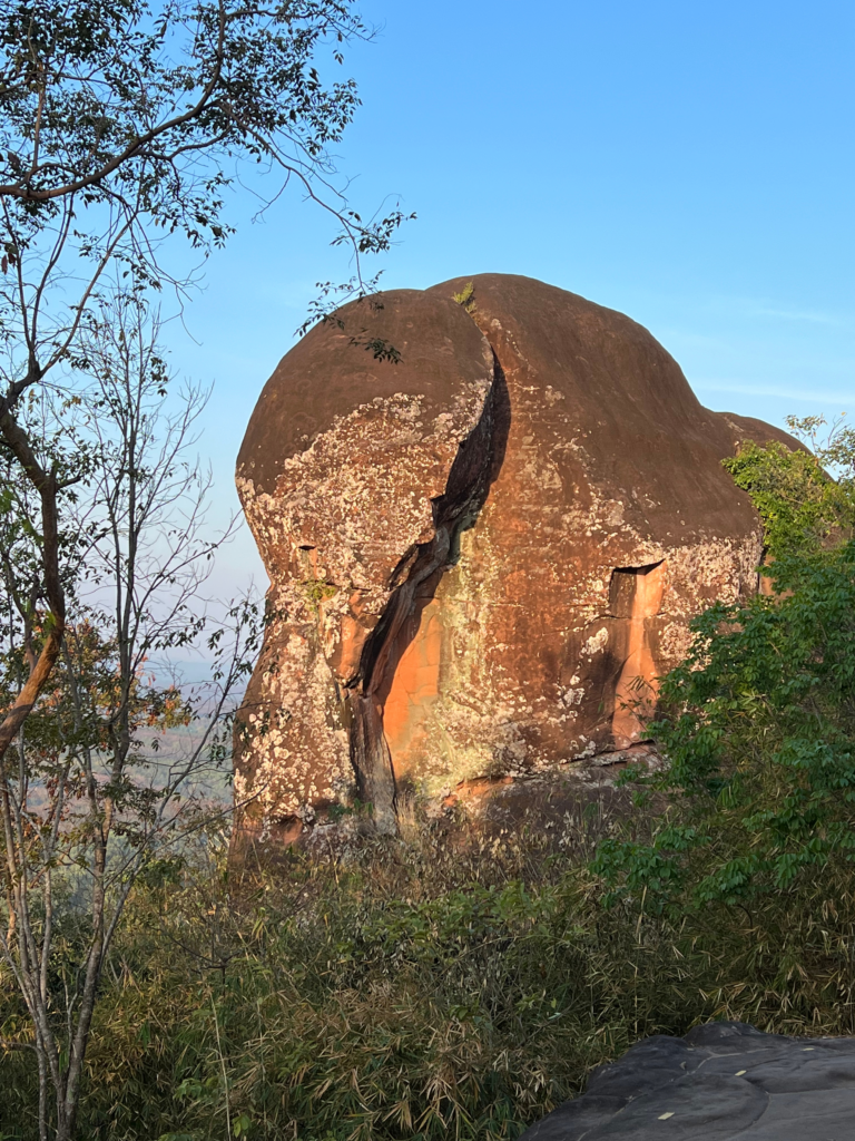 Hidden Thailand: Close-up of Three Whale Rock, a unique natural formation in Thailand, Unusual places in Thailand: The striking textures and colors of Three Whale Rock at sunrise, Hidden gems in Thailand: A scenic view of Three Whale Rock's massive rock structure, Best secret spots in Thailand: A stunning perspective of Three Whale Rock surrounded by nature, Off-the-beaten-path Thailand: A breathtaking rock formation standing tall in the early morning light