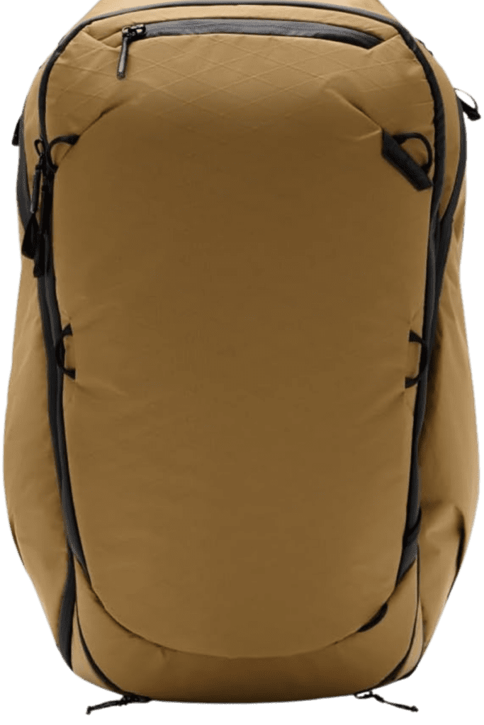 Coyote-colored travel backpack with a built-in laptop sleeve, demonstrating its tech-friendly storage.