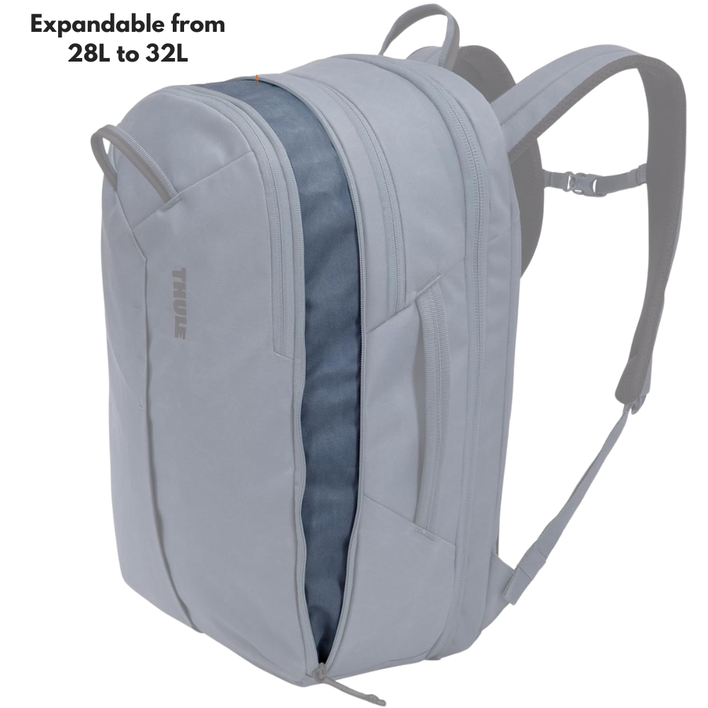 expand.png – Thule backpack expanded from 28L to 32L, highlighting its adjustable storage capacity.