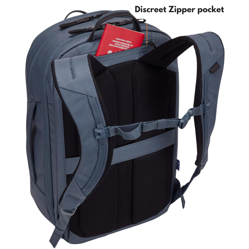 pocket.png – Rear view of the Thule backpack, featuring a discreet zipper pocket with a passport inside for secure storage.